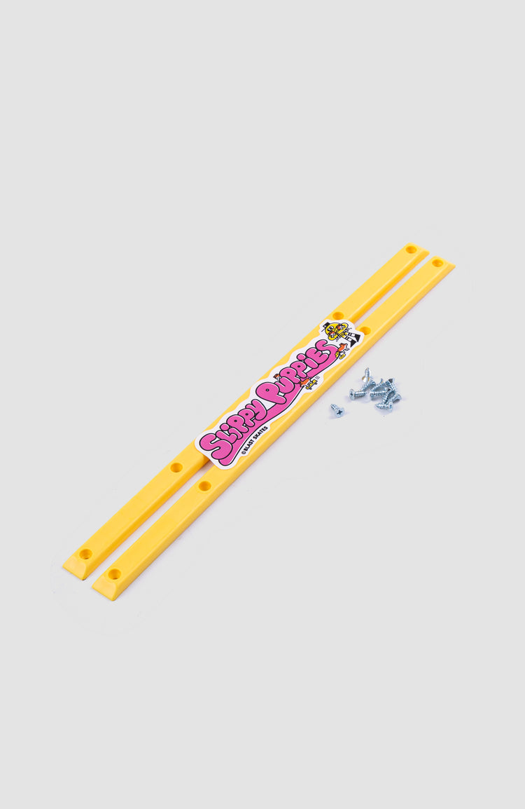 zwei gelbe Skateboard rails zum befestigen unter dem deck - mit schrauben